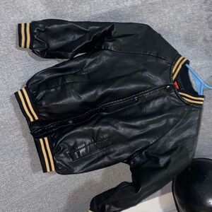 Peanuts Black Puffer Jacket with Gold Stripes